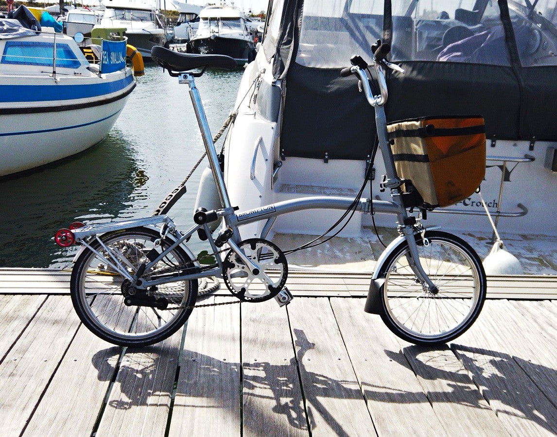 Brompton M6R Folding Bike 16in Silver w/ Front Bag and Carry Bag. Pump, Light.