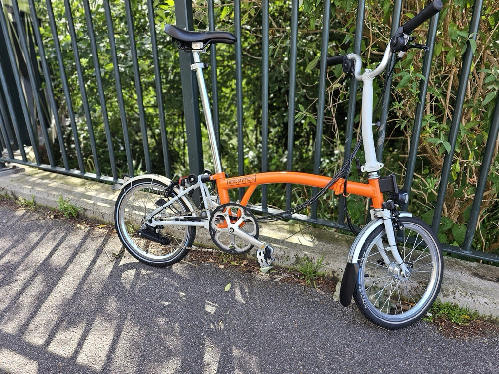 Brompton Folding Bike 16in Wheels Orange/white Silver Mudguards Cruiser Bar