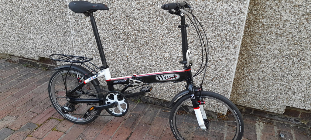 Oyama folding bike, 20 inch wheels, 8 speed.