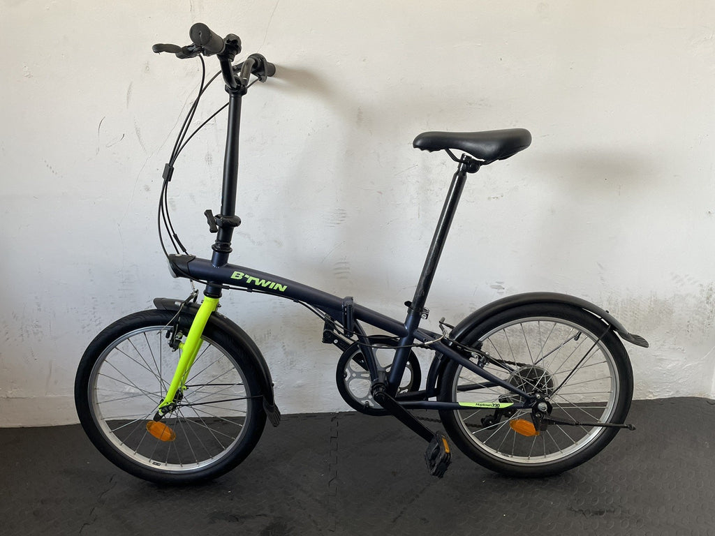 B Twin Tilt 120 Folding Bike 20 Inch Wheels. 6 Speed Matt Navy And Neon.