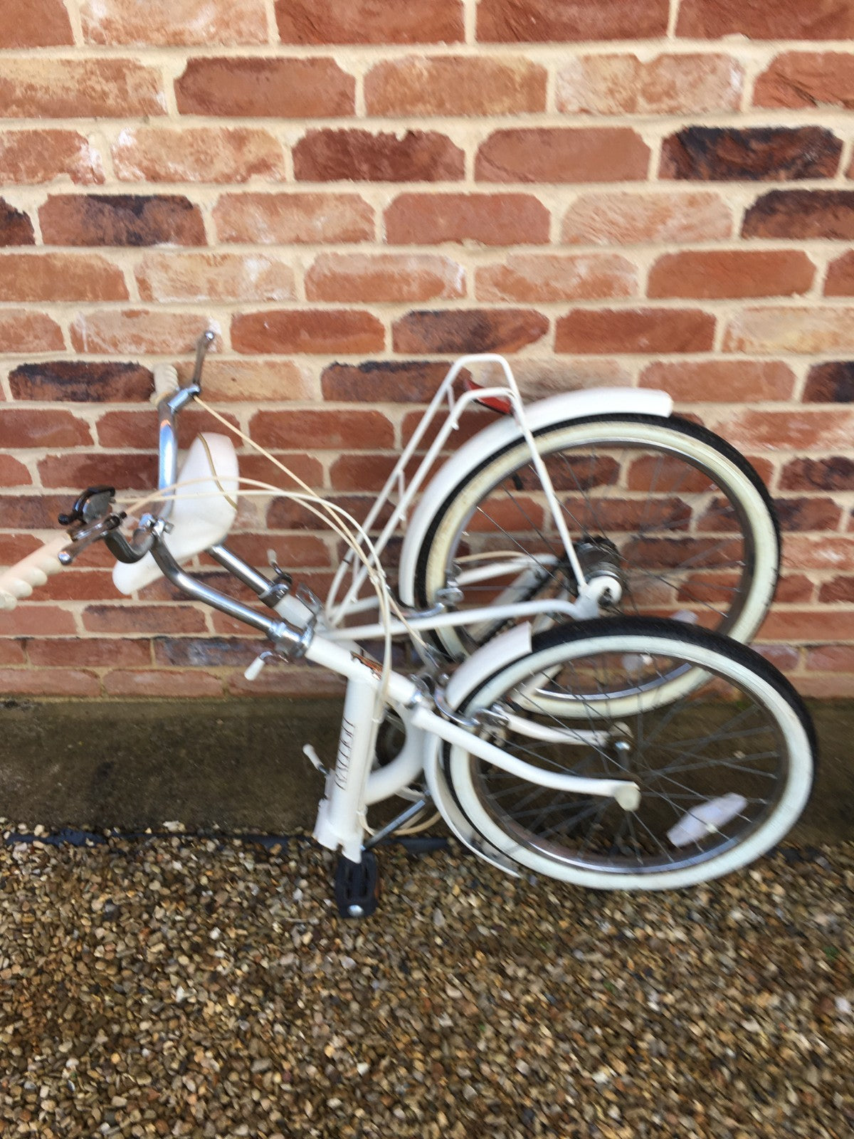 Raleigh Compact white foldable unisex bicycle used,