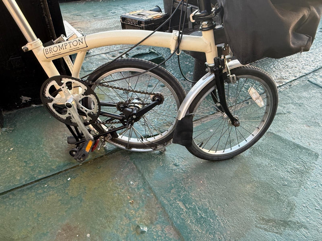 2 Bromptons. 1 x   Navy 6 Speed DYNAMO Light 1 x cream 5 speed.
