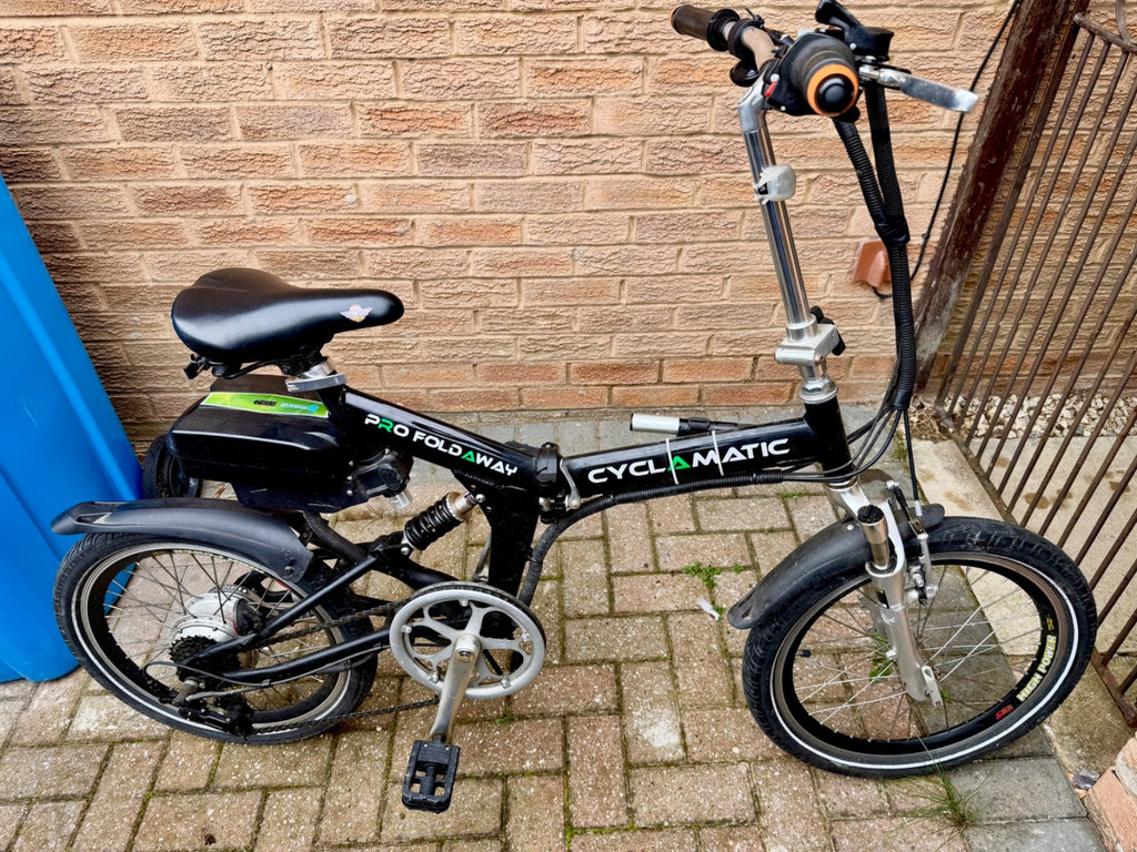 Two used foldable, pedal bikes with Shimano gears and front/back suspension