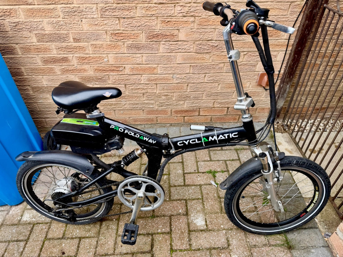 Two used foldable, pedal bikes with Shimano gears and front/back suspension