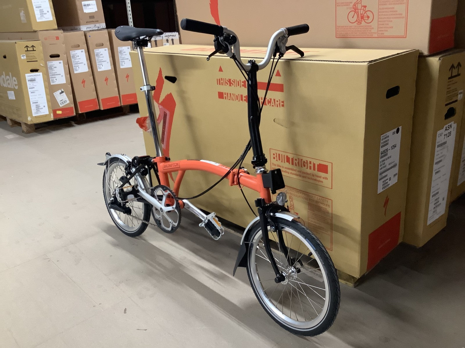 Brompton C-Line Explore Mid bar Folding Bike Fire Coral