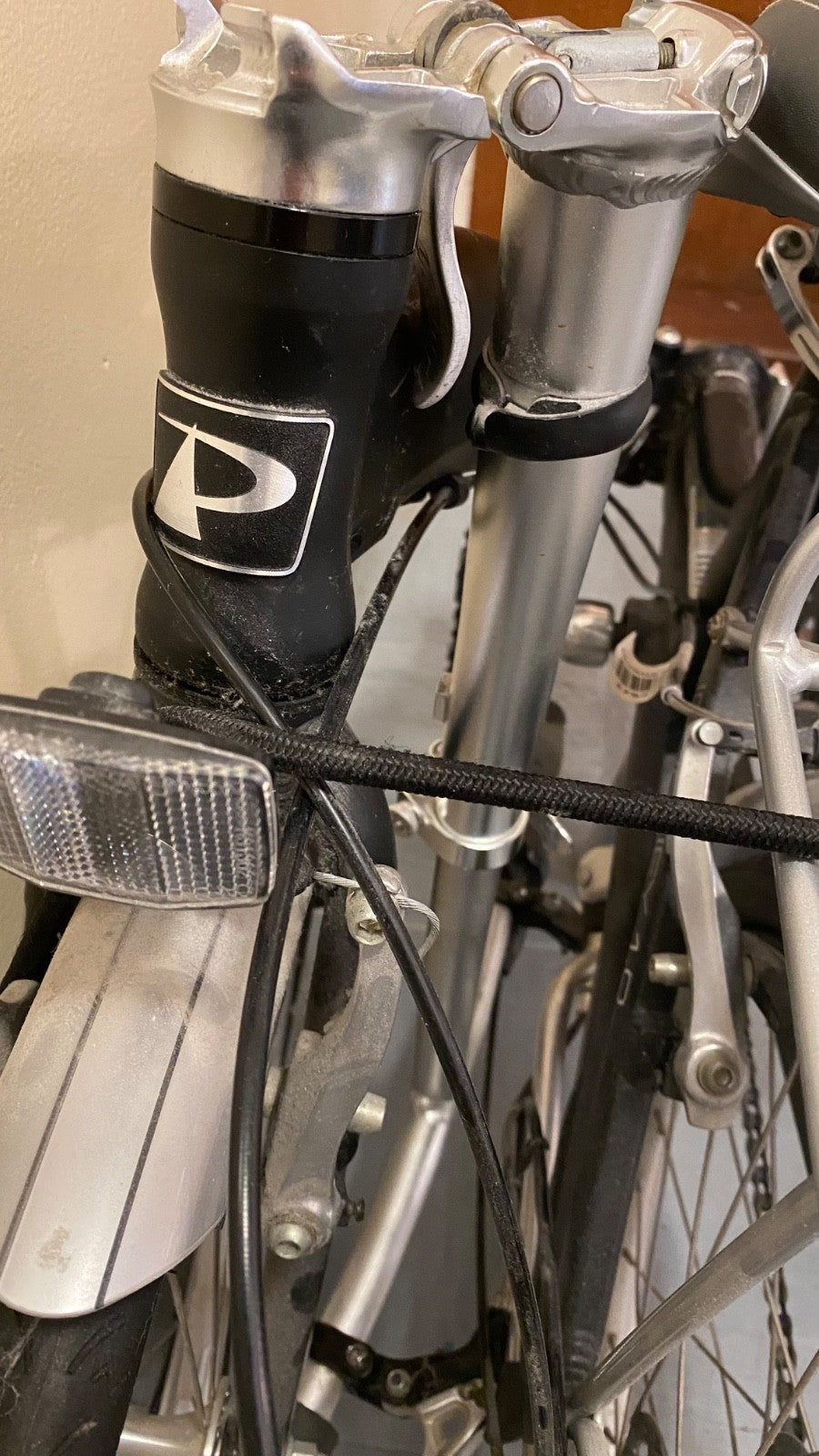 Pinnacle Journey 1.0 folding bike in matte black. Shimano Nexus 3-speed.