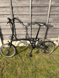 Brompton Folding Bike 16 in M Black Mudguards Rear Rack Reflectors Riser