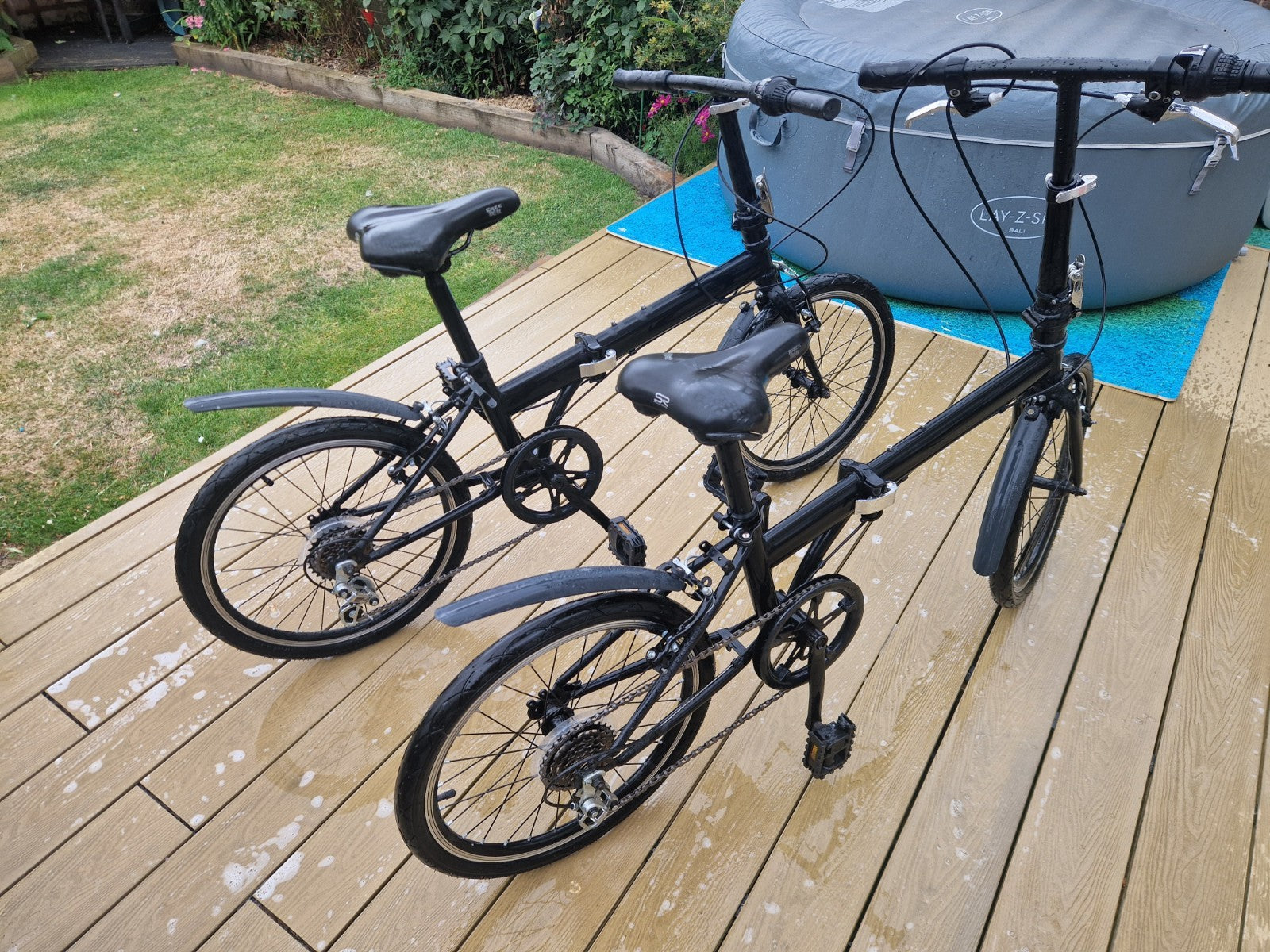 2x Black Folding Bikes w/ Mudguards, V-Brakes, Flat Bar, Grip Shifter