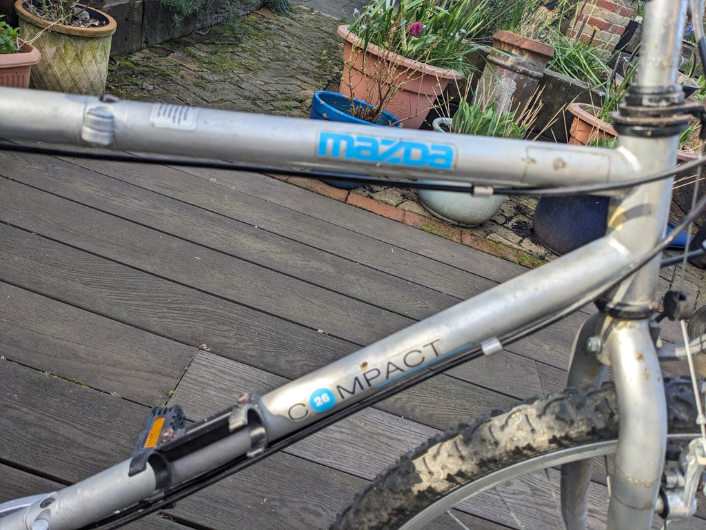 Mazda 26” Compact foldable Town and Country bike.  Minimal use.  Great condition