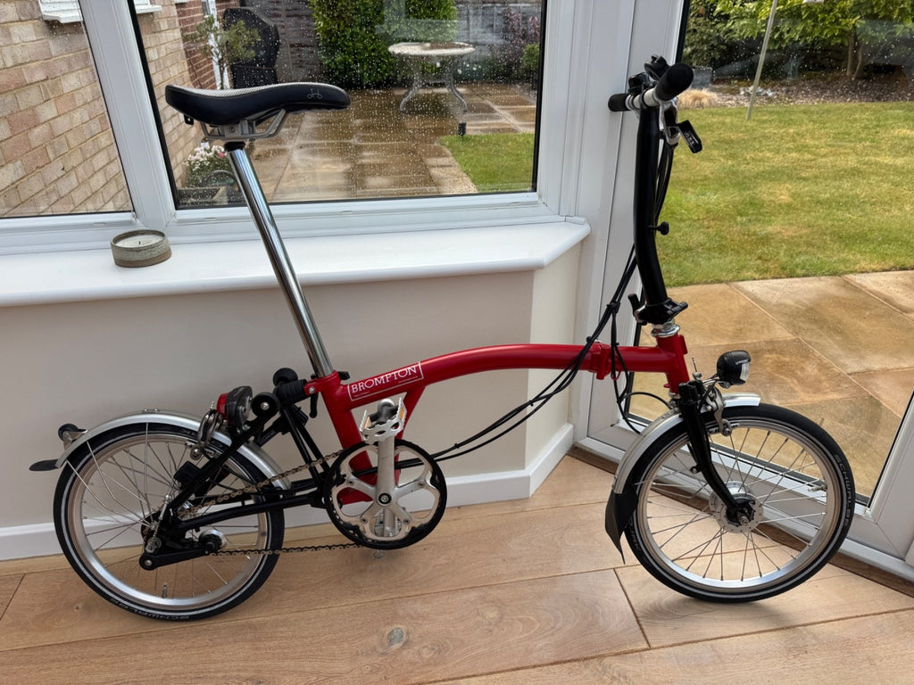 Brompton 3-speed folding bicycle, red, immaculate condition, hardly used