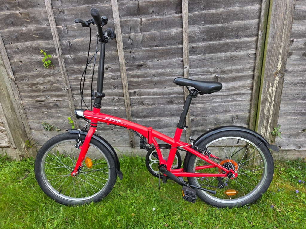 Btwin pre-owned folding bike, red, in very good conditions + bonus (sturdy bag)