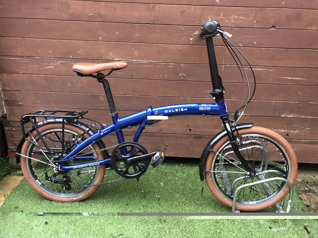 Raleigh Stowaway Folding Bike. 20” wheels. Good condition. 2023 Blue