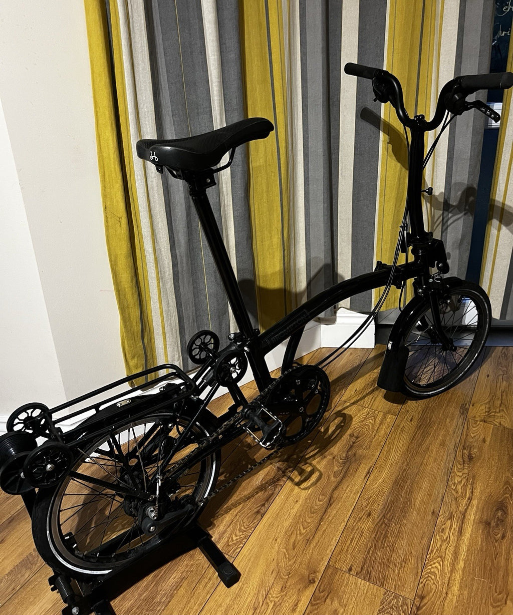 Brompton 6-Speed Black edition with panier rack and roller wheels