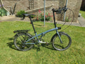 Ultra Upgraded Tilt 120 Folding Bike 7 speeds, Rear Rack + Waterproof Bags