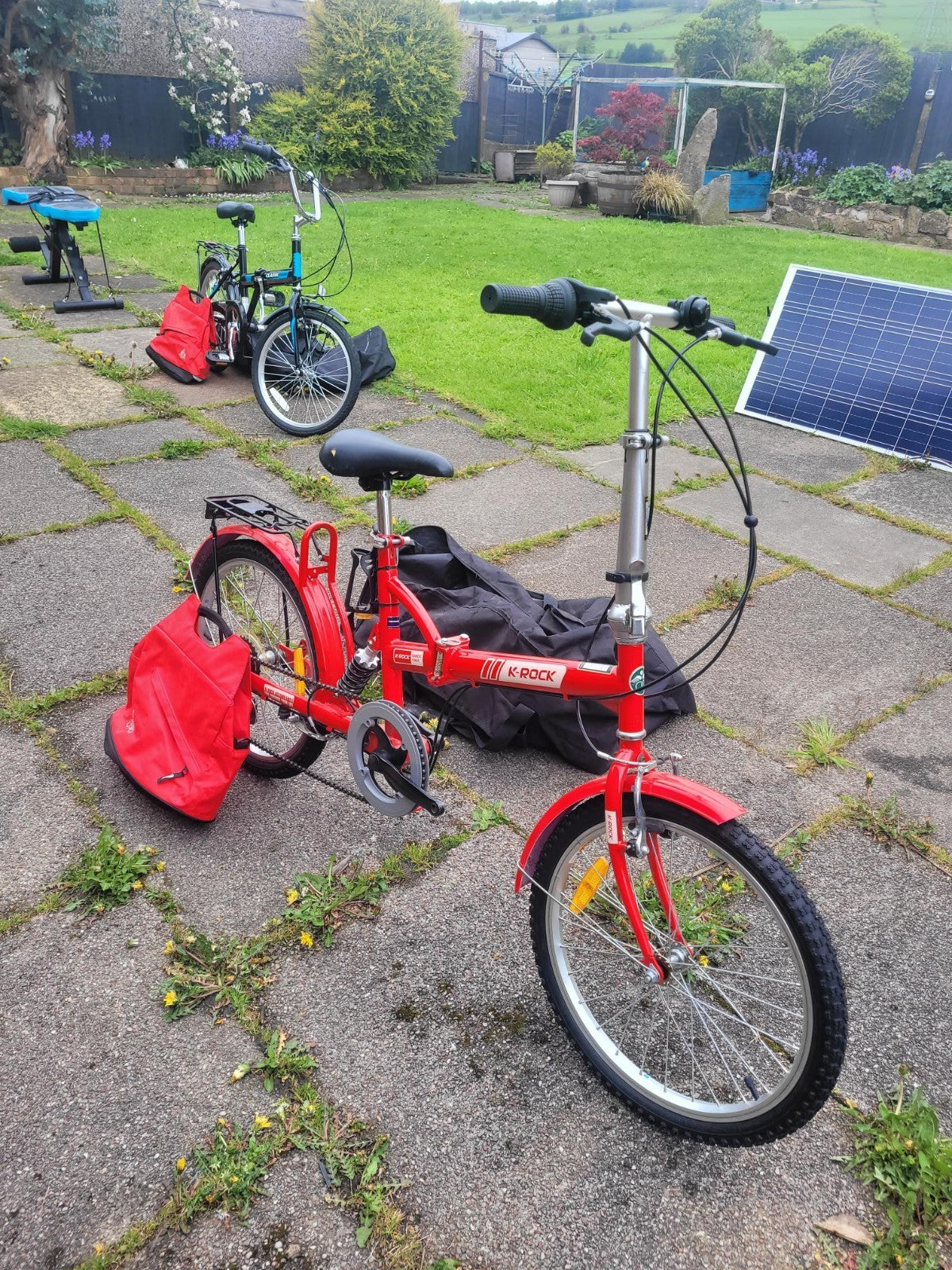 2 Fold-able bicycle with storage bags, black and red.