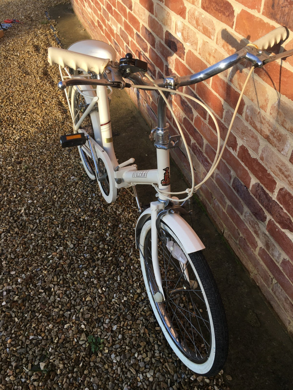 Raleigh Compact white foldable unisex bicycle used,