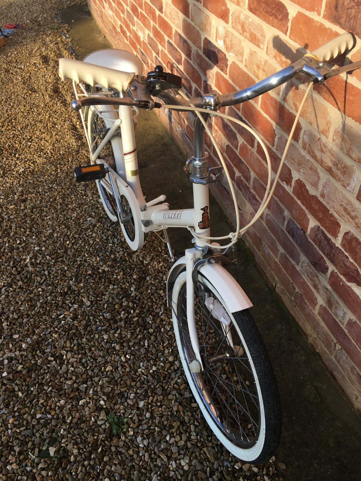 Raleigh Compact white foldable unisex bicycle used,