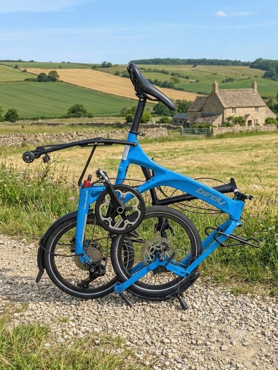 Birdy by Riese & Muller 18in, Cyan Blue  Hydraulic Disc, Front Susp, Lighting