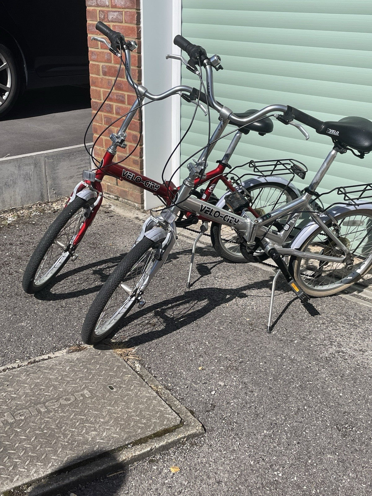 A Pair Of Velo-city 5 Speed Folding Bikes In Good Condition With Bags