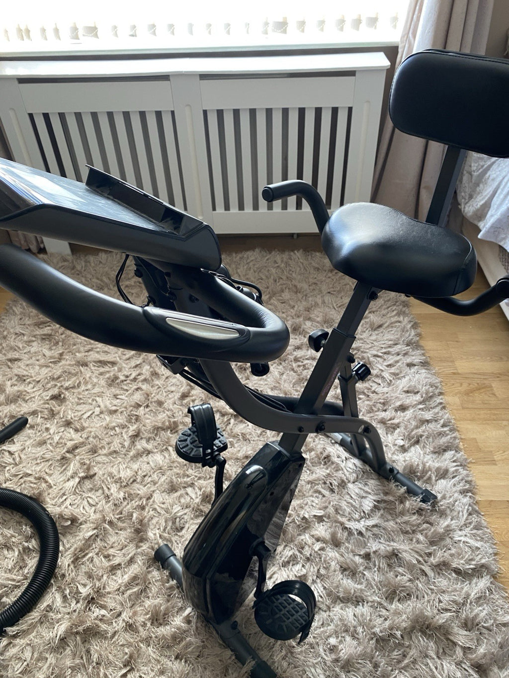 Slim Cycle foldable exercise bike worth over £200. Compact and sturdy