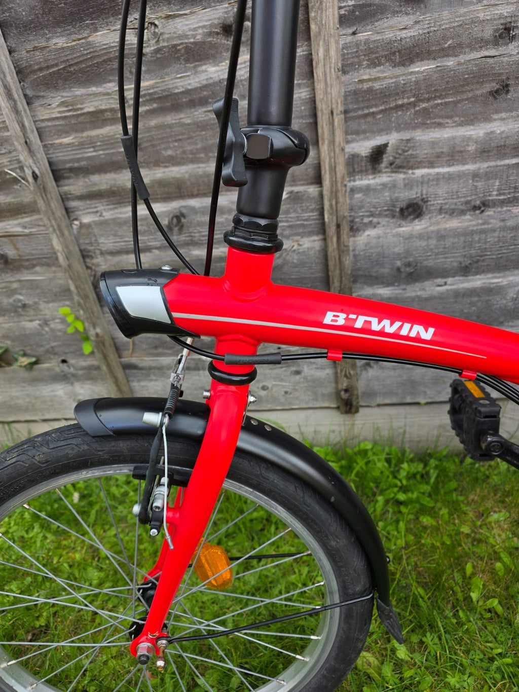 Btwin pre-owned folding bike, red, in very good conditions + bonus (sturdy bag)