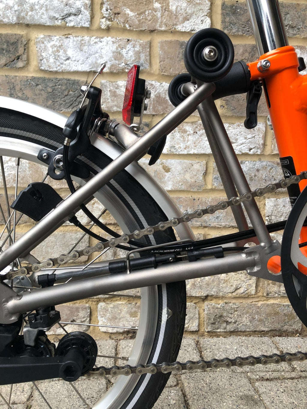 Brompton Signal Orange Superlight Titanium RARE S6L-X with Brooks - WORLD POST