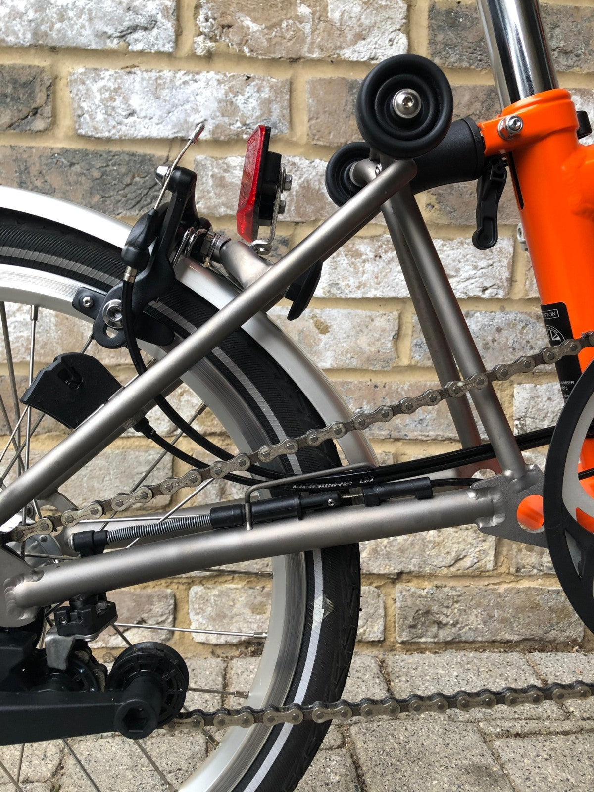 Brompton Signal Orange Superlight Titanium RARE S6L-X with Brooks - WORLD POST