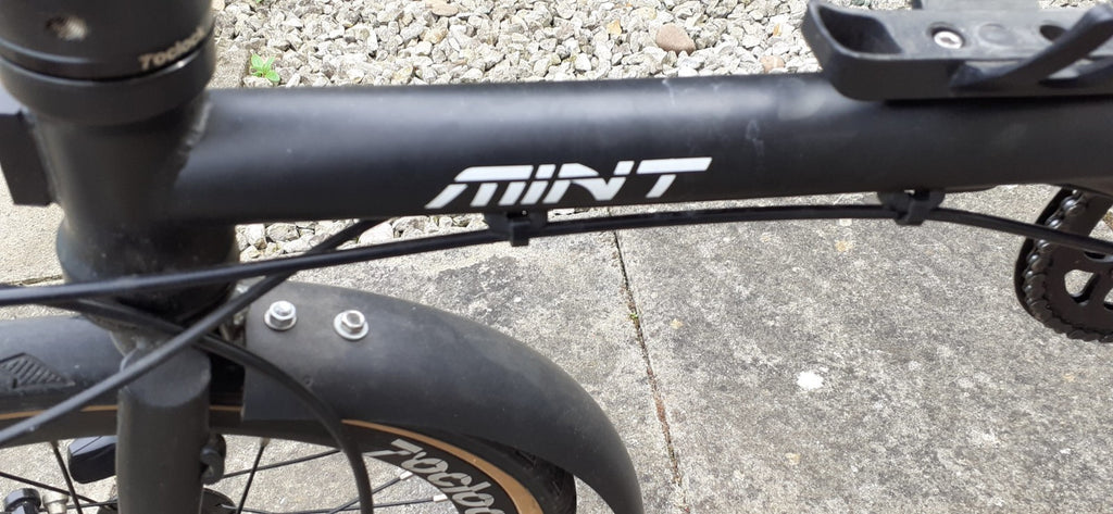 MINT bike 9 Speed Folding Bike with 16 Inch 349mm Wheels with disc brakes.