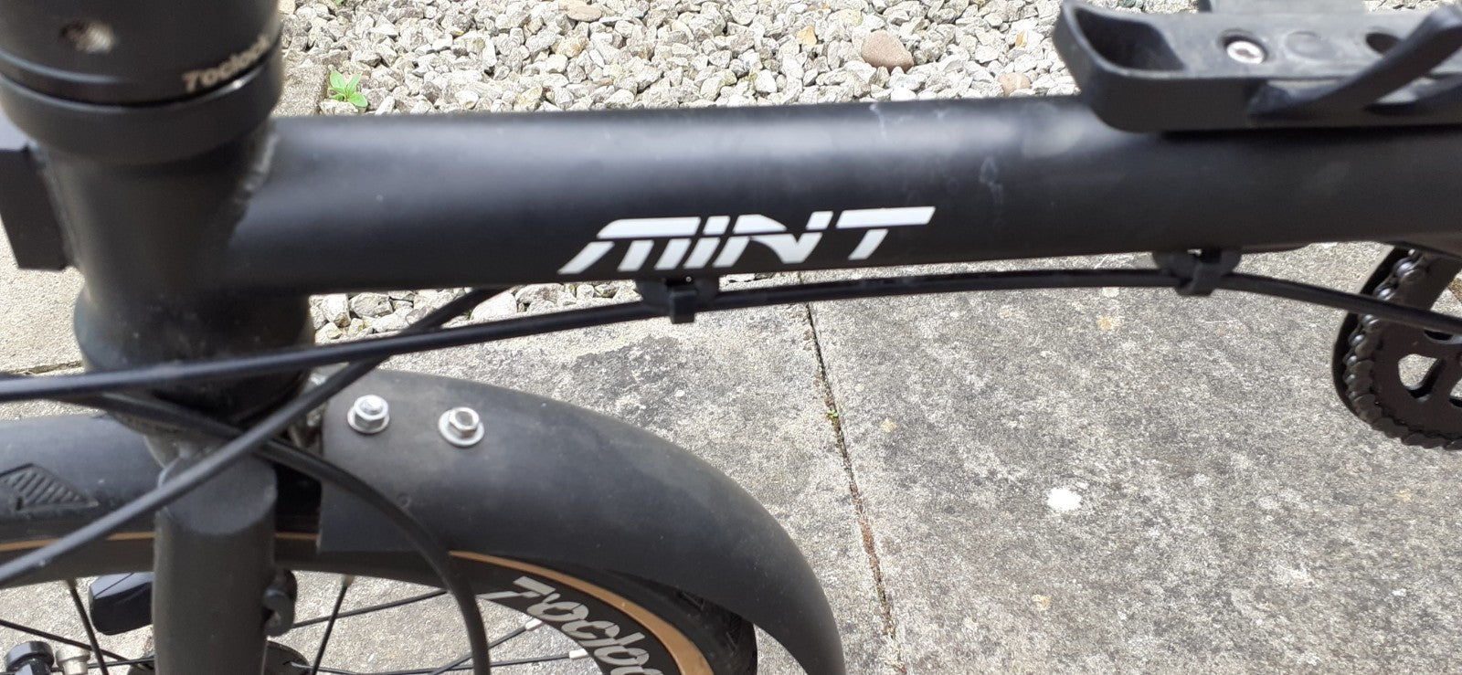 MINT bike 9 Speed Folding Bike with 16 Inch 349mm Wheels with disc brakes.
