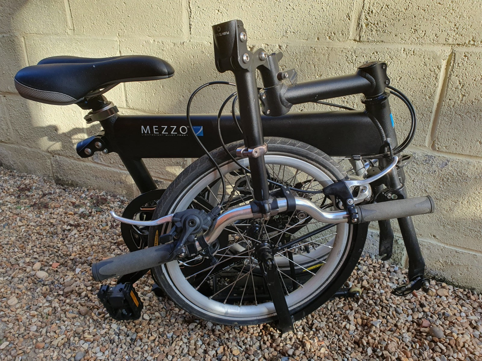 Mezzo D9  9-speed folding bicycle, black, very good condition, with carry bag.