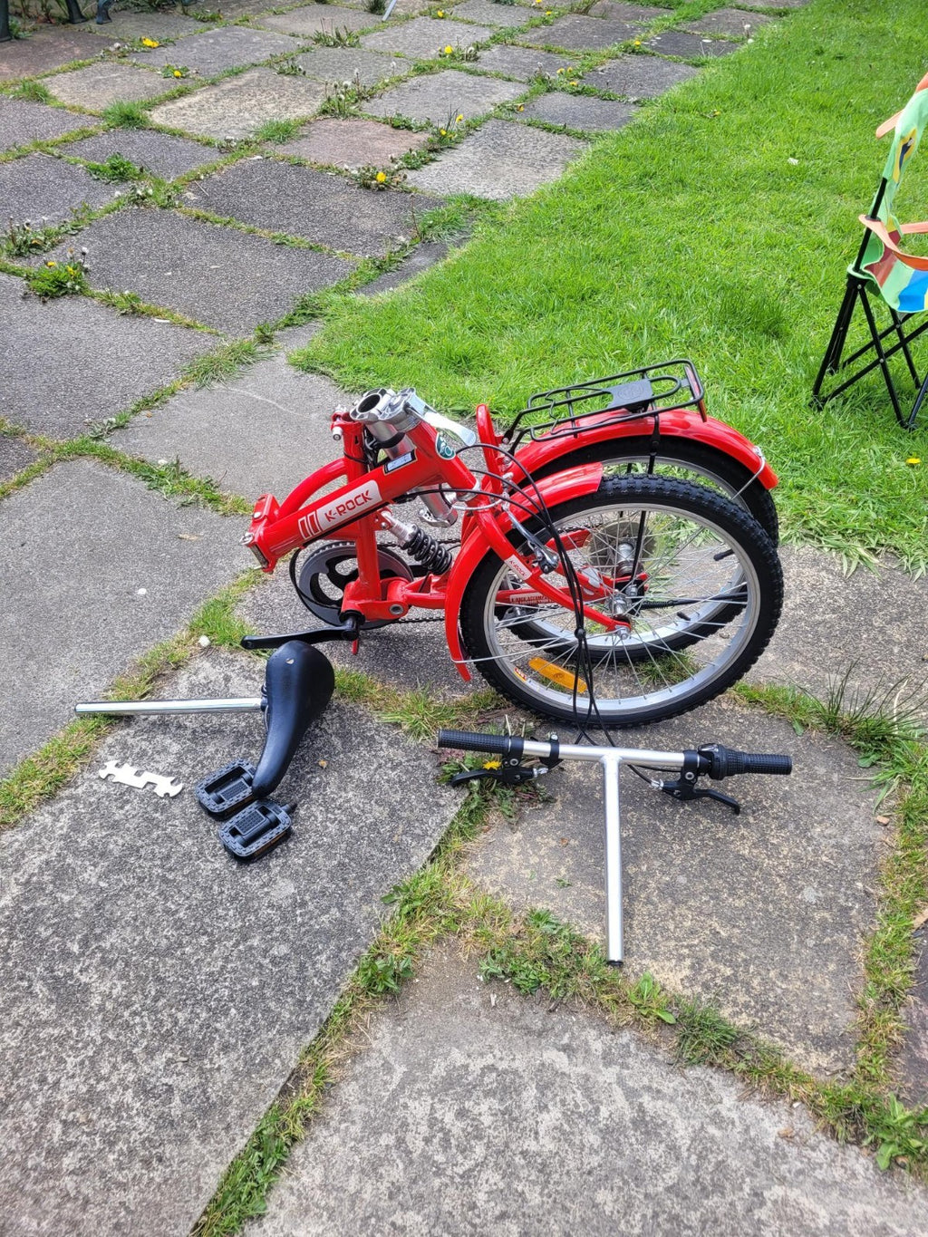 2 Fold-able bicycle with storage bags, black and red.