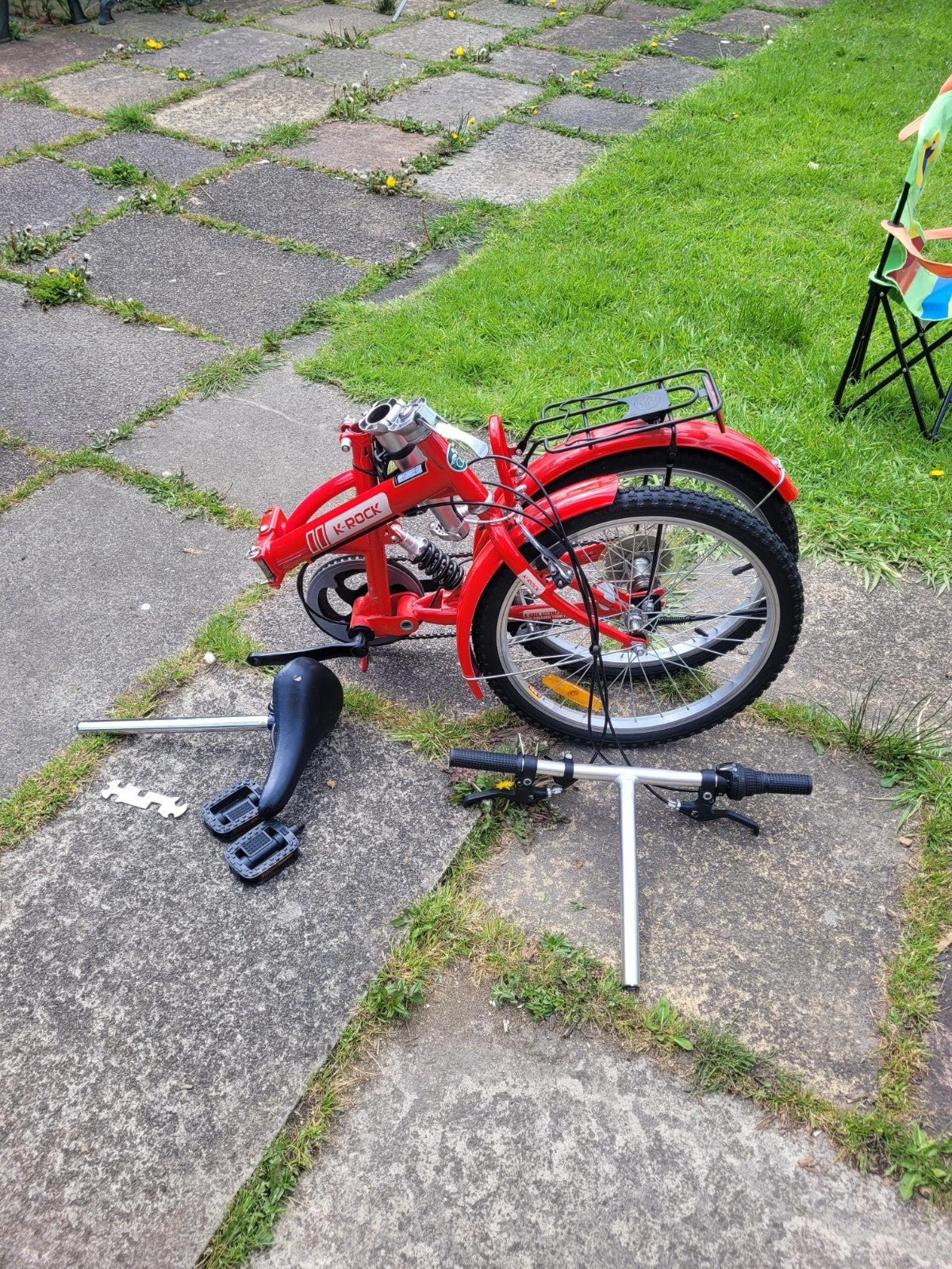 2 Fold-able bicycle with storage bags, black and red.