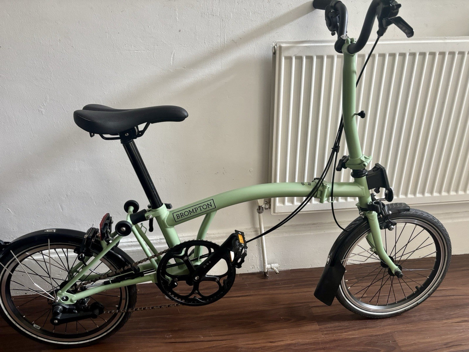 Brompton C Line 2 Speed Matcha Green 2023 with brompton bag and pump