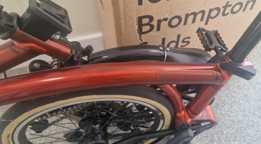 Brompton P Line 12 speed FLAME LACQUER + roller. Low £$🌎 Post📦🛫📮.RRP£2679