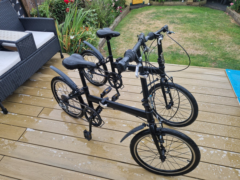 2x Black Folding Bikes w/ Mudguards, V-Brakes, Flat Bar, Grip Shifter