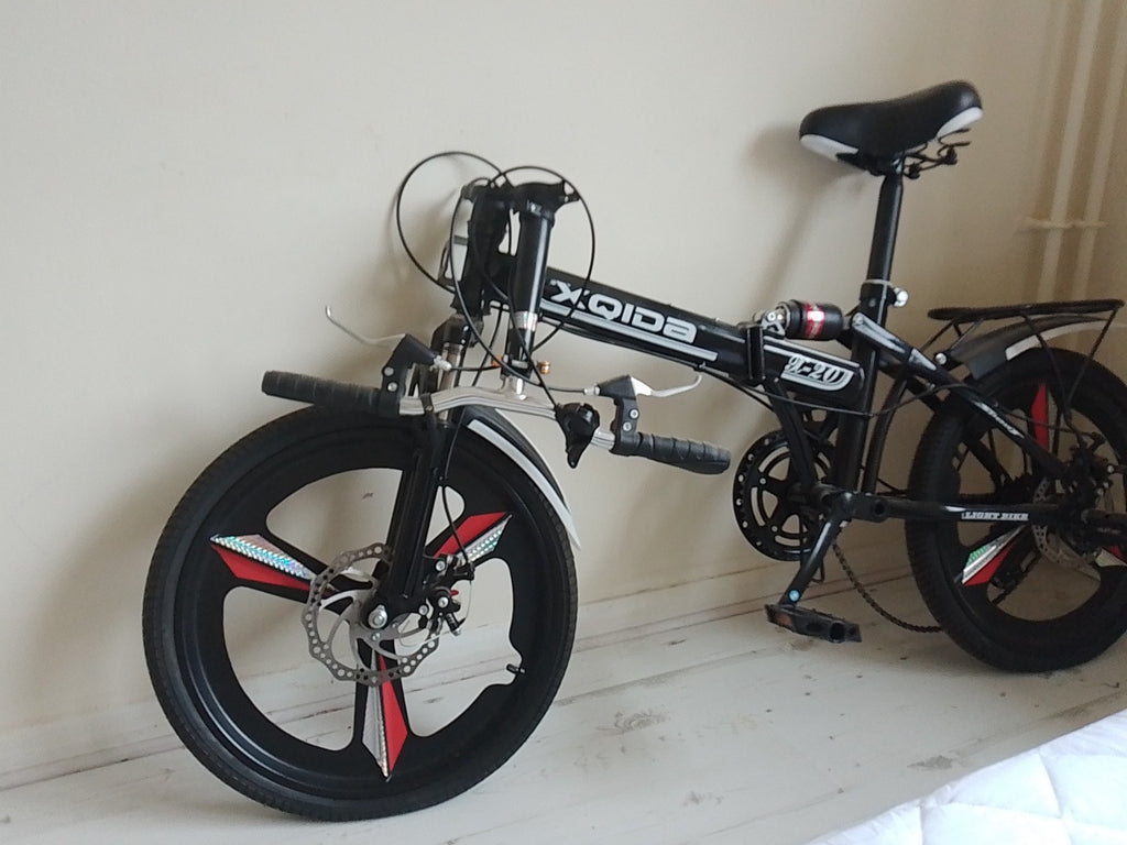 Oyama folding bike, 20 inch wheels, 8 speed.