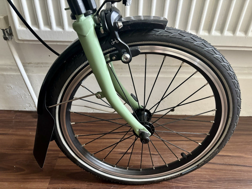 Brompton C Line 2 Speed Matcha Green 2023 with brompton bag and pump