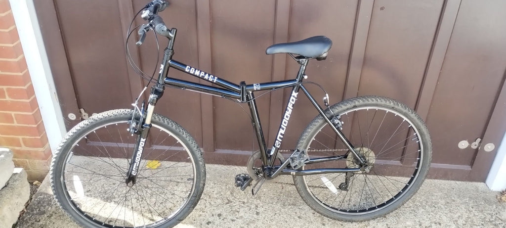 Muddy Fox Compact folding mountain bike.