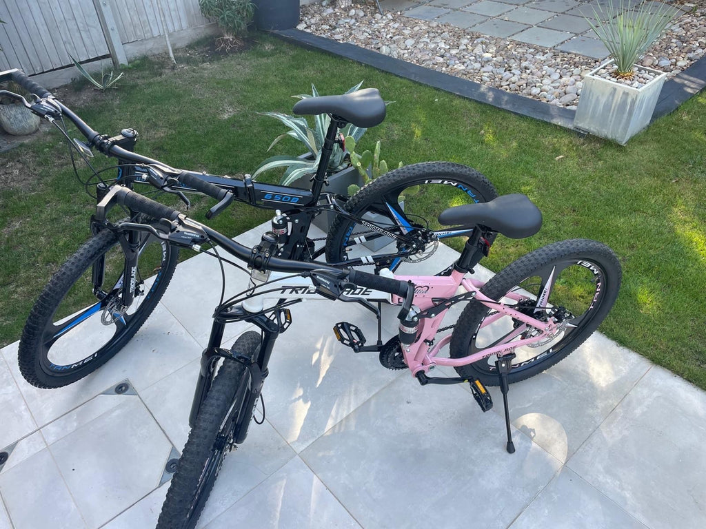 male and female folding mountain bikes - dual susp, disc brakes, multispeed