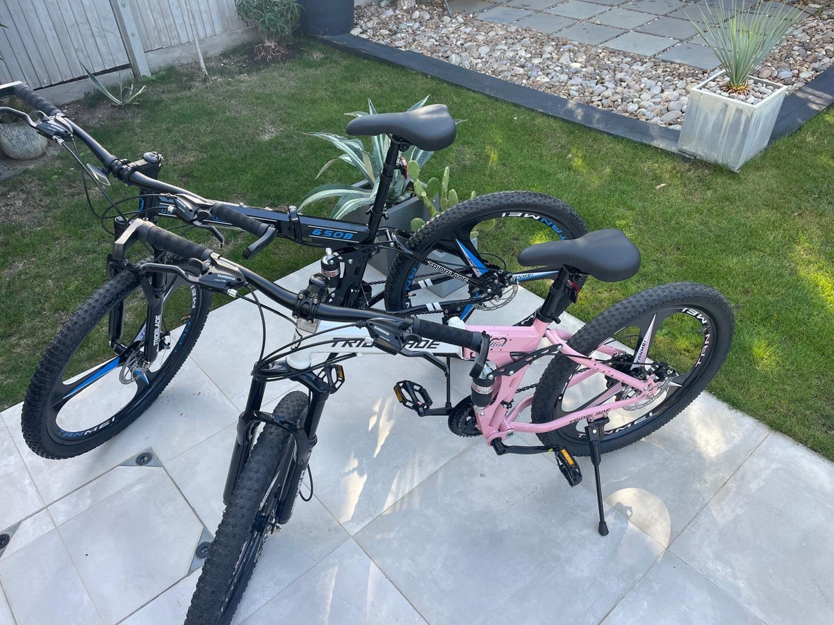 male and female folding mountain bikes - dual susp, disc brakes, multispeed