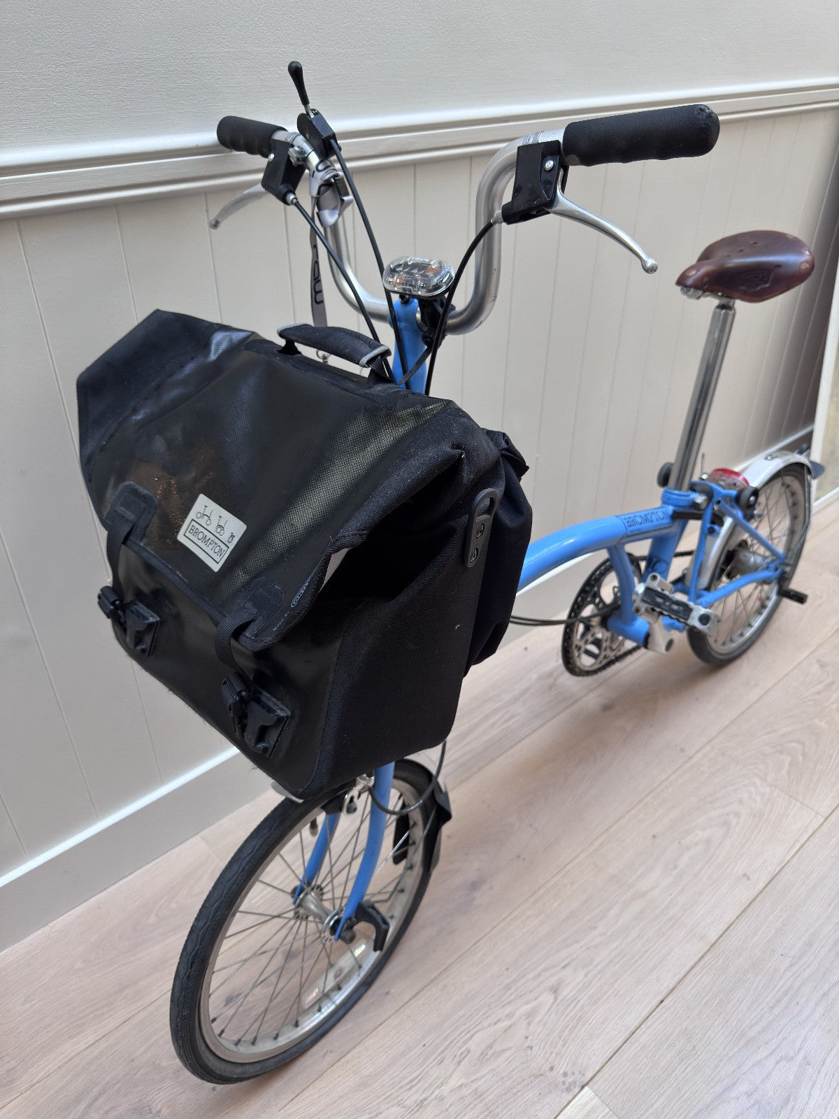 Brompton 3 speed folding bike, Brooks saddle, Ortlieb rack bag