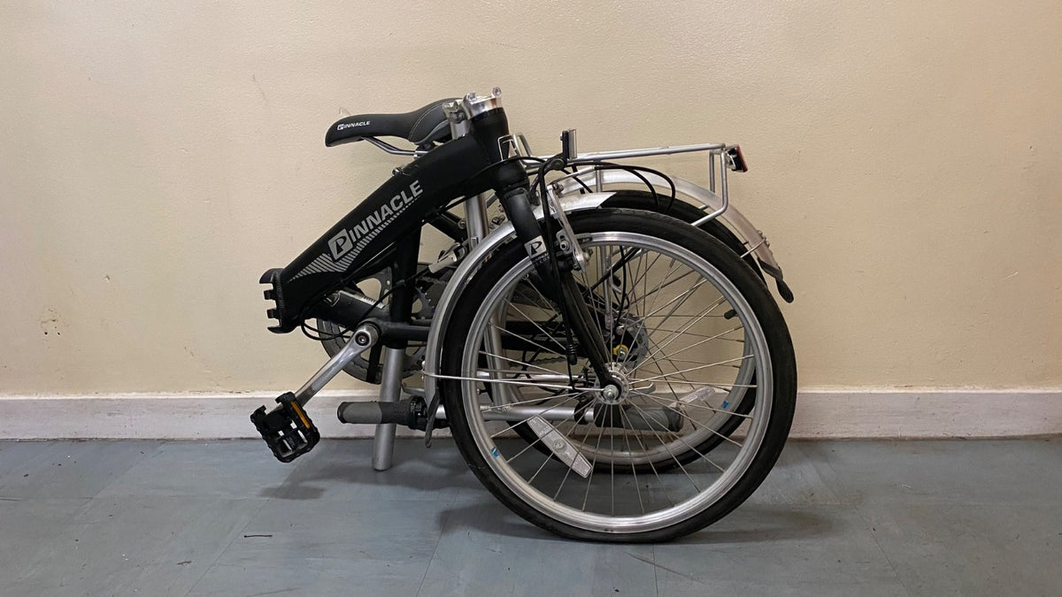 Pinnacle Journey 1.0 folding bike in matte black. Shimano Nexus 3-speed.