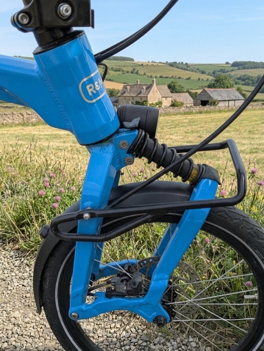 Birdy by Riese & Muller 18in, Cyan Blue  Hydraulic Disc, Front Susp, Lighting