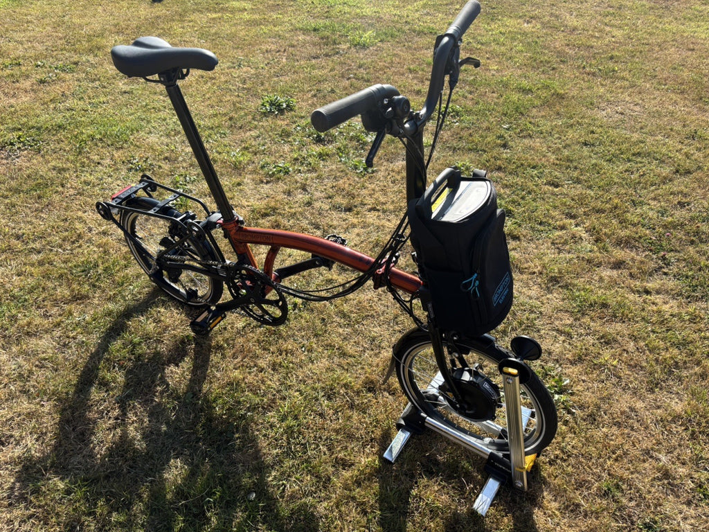Brompton Electric C Line Explore Mid + Rack - 12 Spd - flame lacquer