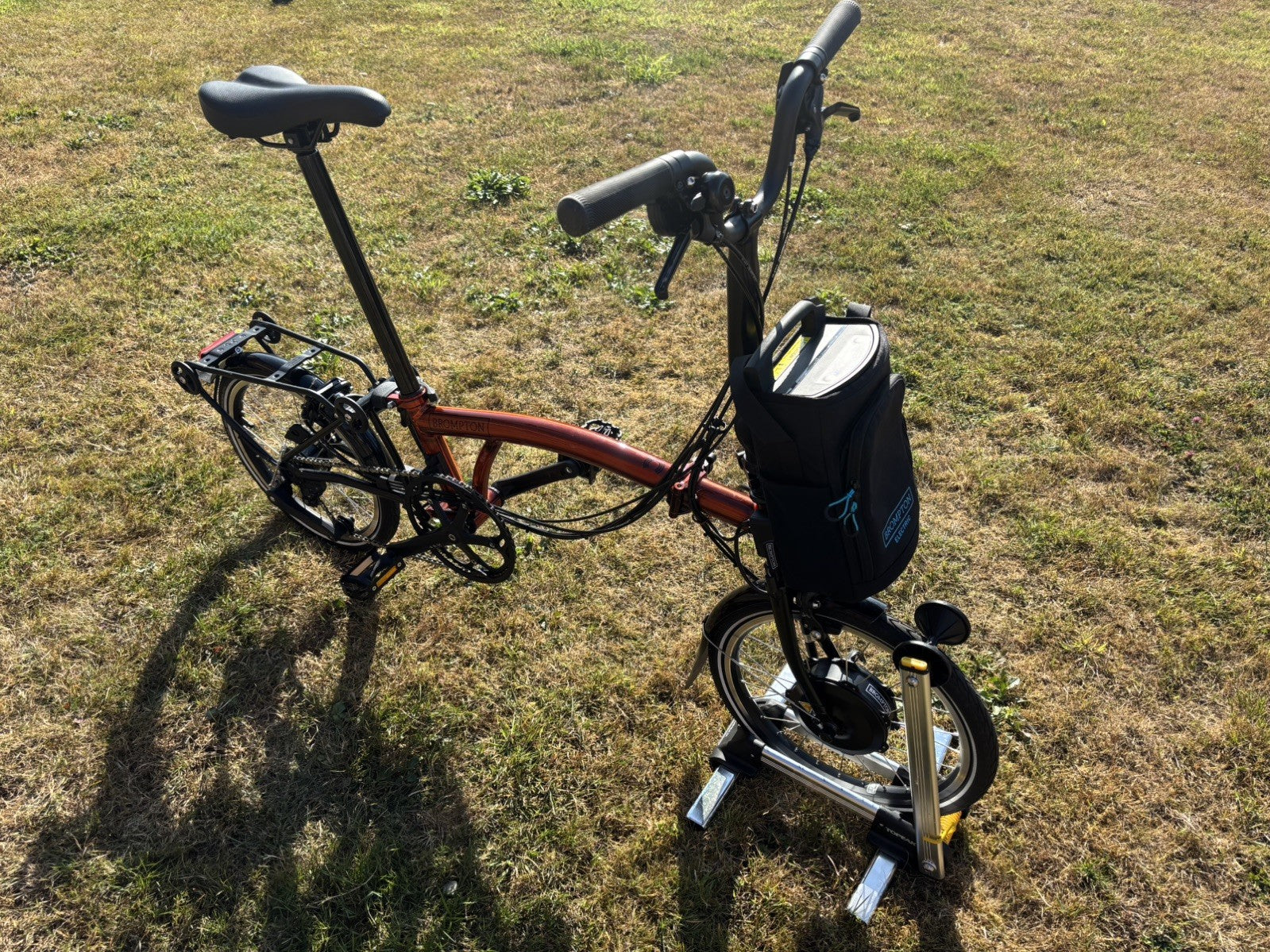 Brompton Electric C Line Explore Mid + Rack - 12 Spd - flame lacquer