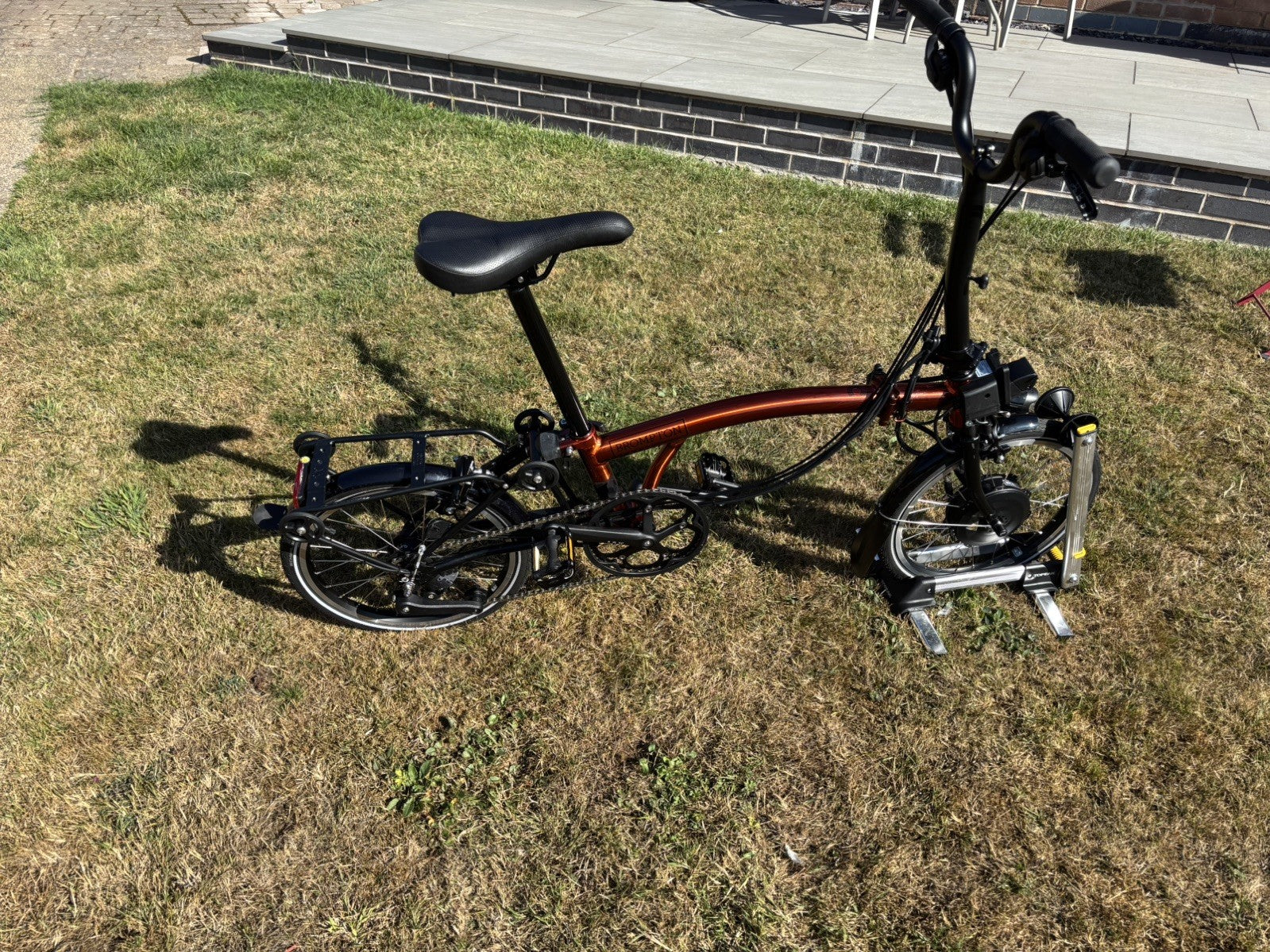 Brompton Electric C Line Explore Mid + Rack - 12 Spd - flame lacquer