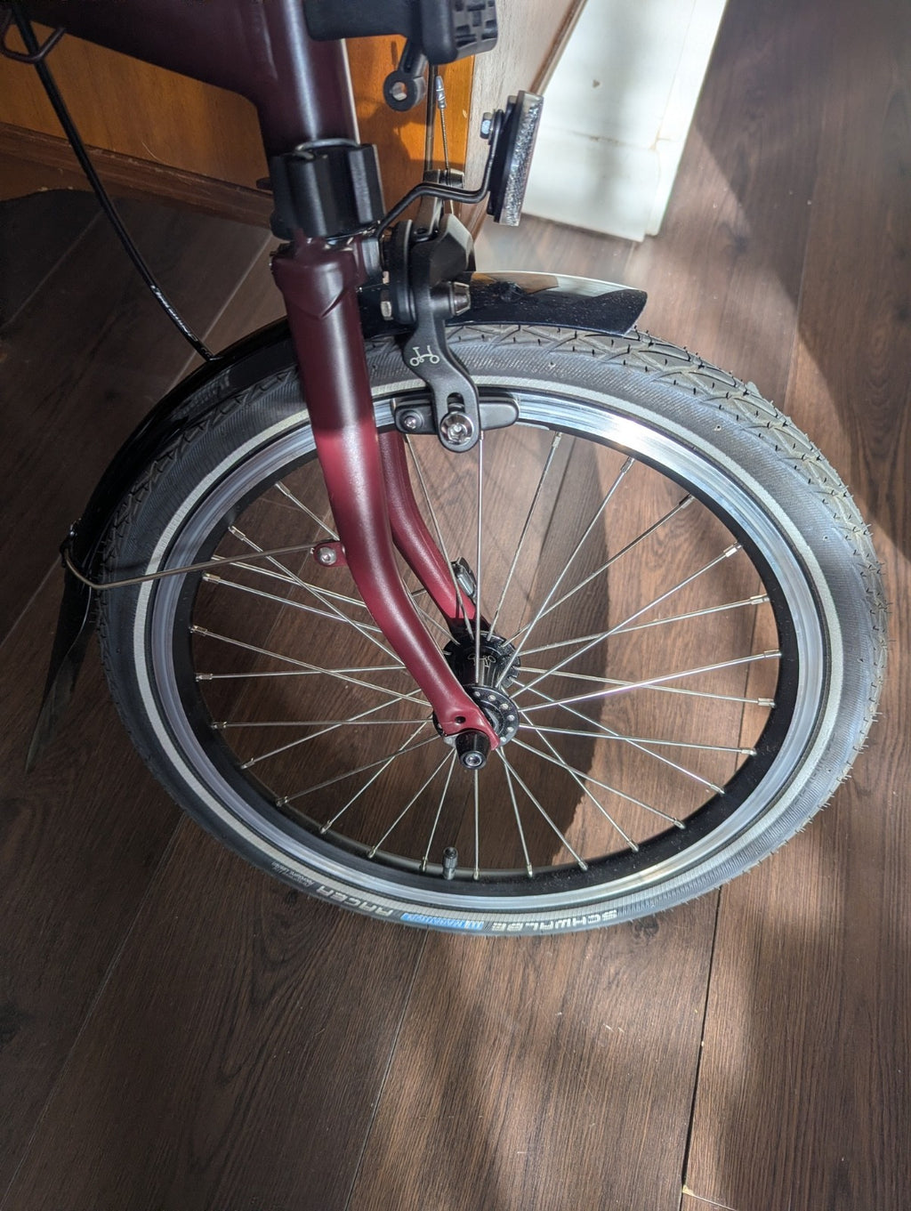 Brompton bike C-line 12-speed 2026 mid bar in Burgundy colour