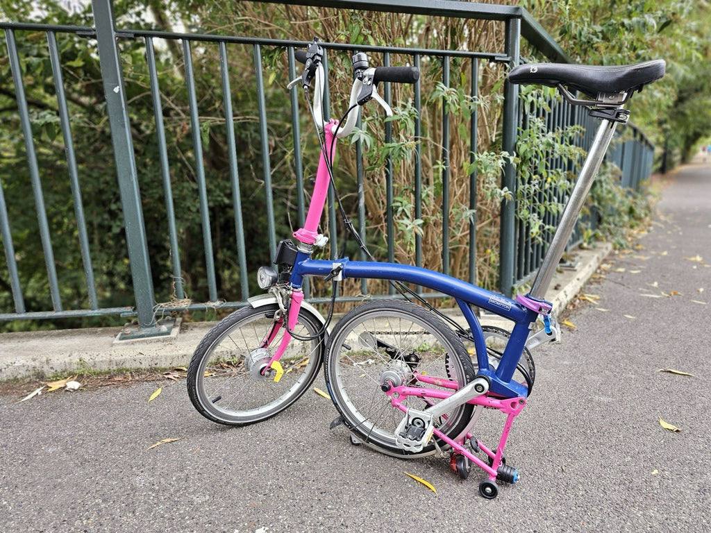 Brompton  c line 2012 Folding Bike 16 in M Frame Blue/Pink Mudguards lights