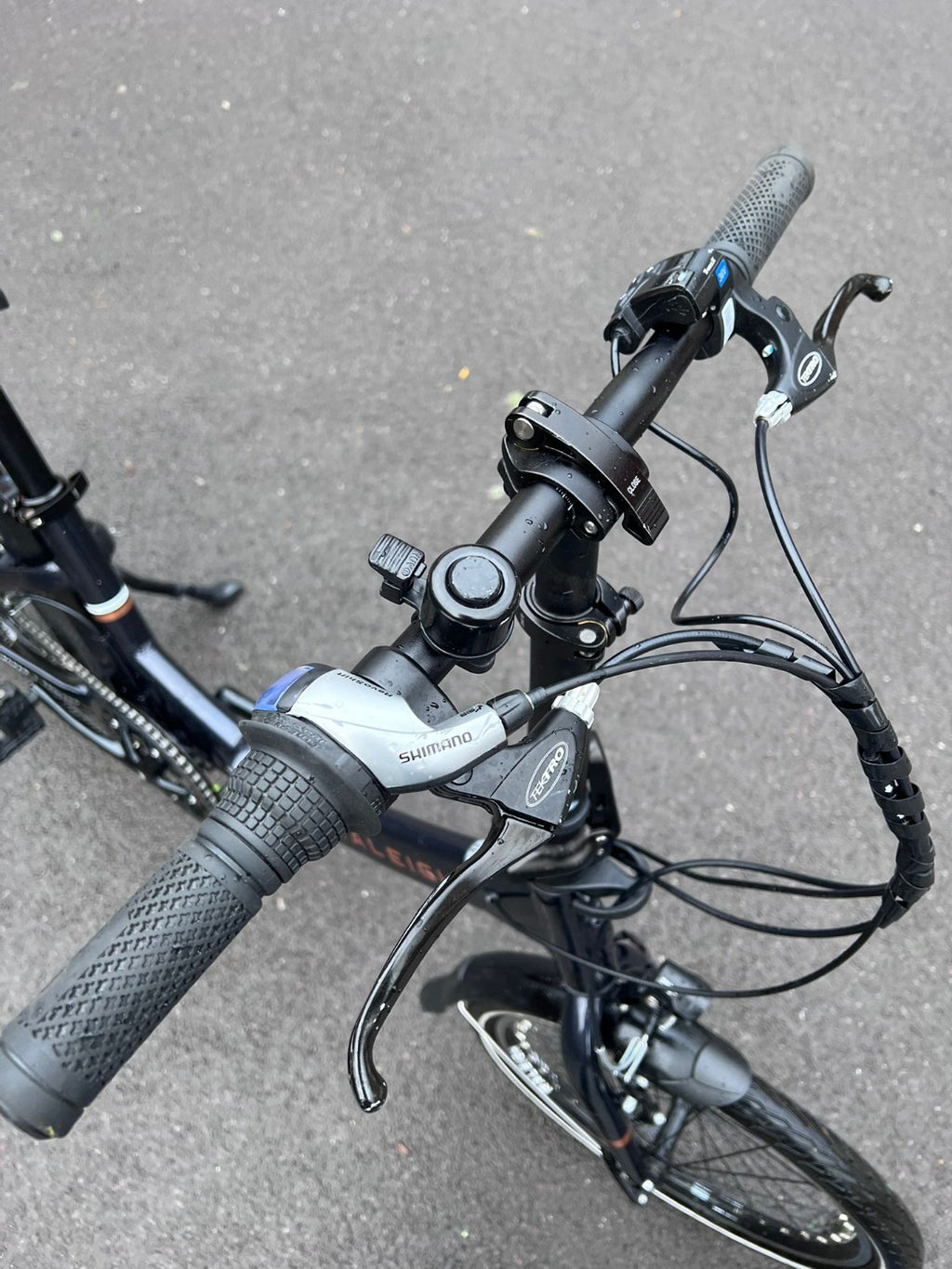 Raleigh Stow-E-Way Folding Bike In Dark Blue Designed to be packed away