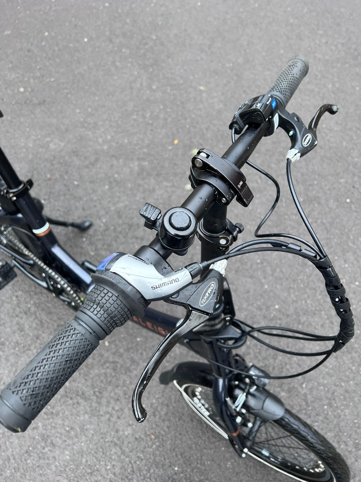 Raleigh Stow-E-Way Folding Bike In Dark Blue Designed to be packed away